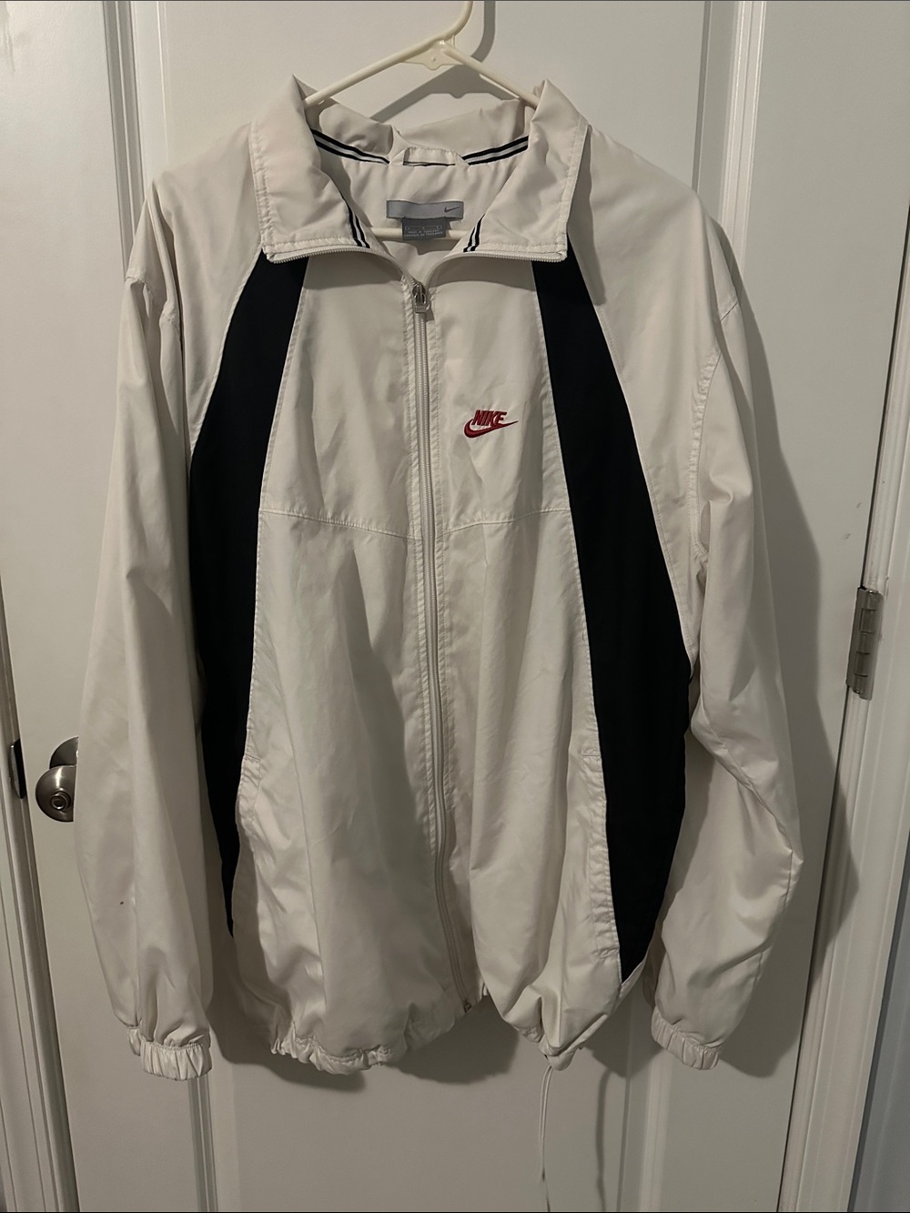 Nike White Jacket with Black Panels and Red Logo